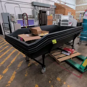 Poly portable dump merchandise rack. Features a black molded poly tub and black metal frame. 105" x 50". Mounted on casters. Note: Includes one poly t