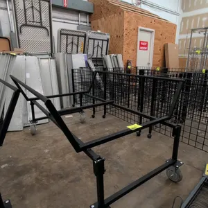 Portable merchandise dump rack. Features black molded poly top and black metal frame base. 105" x 50". Mounted on swivel casters. Note: Includes (1) p