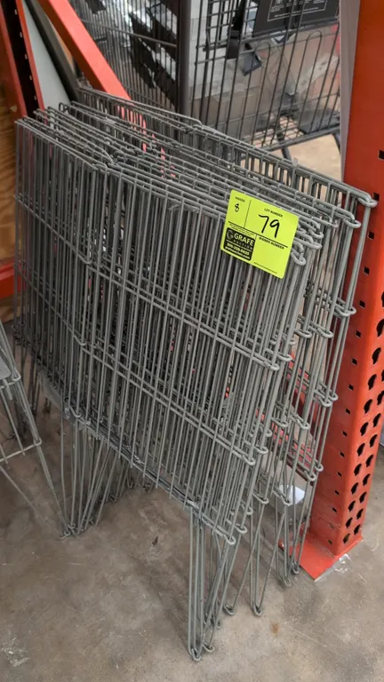 Metal wire merchandise display dump bins. Features folding wire construction with integrated wire legs. Dimensions: 15" x 30"H.