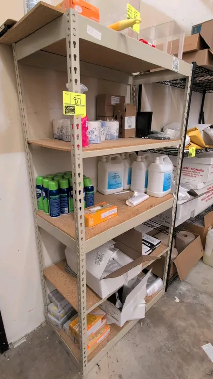 5-tier metal storage rack. Features adjustable boltless frame and composite board decking. 3' x 1-1/2' x 6'. Contents not included.