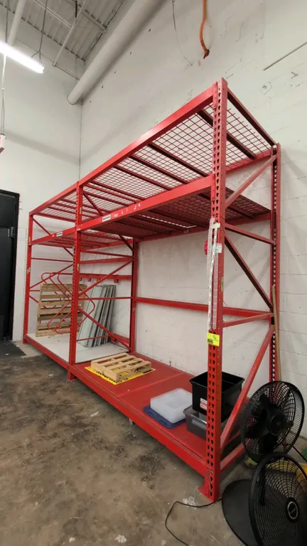 8'L Madix metal teardrop pallet racking sections. Features 3-1/2" crossbars, wire decking, particle board decks, and metal decks. Dimensions: 4'W x 10