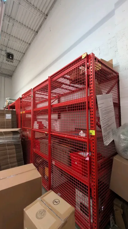 8'L of Madix metal teardrop pallet racking. Features 3-1/2" to 5" crossbars, particle board decking, and wire mesh decks. Dimensions: 4'W x 10'H uprig