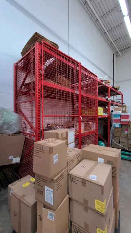 20'L of Madix teardrop pallet racking. Includes (2) 8' sections and (1) 4' section. Features 3.5" crossbars, wire decking, particle board decking, and