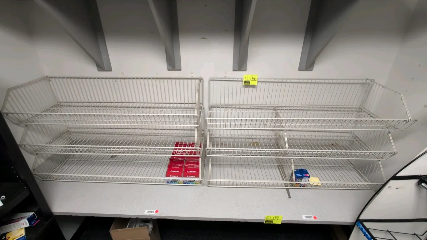 Stackable metal wire display dump baskets. Features white wire construction with an open-front design for product merchandising. 4'L. Contents not inc