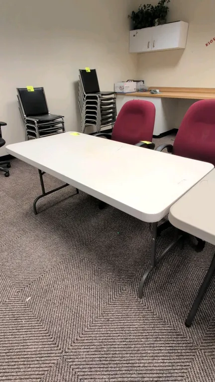 Poly folding tables. Includes (1) 5'L table and (1) 6'L table. Features white molded polyethylene tops and gray folding metal tube bases. Chairs and b