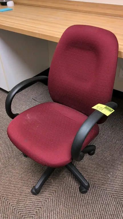 Corporate Express cloth cushioned office chair. Features burgundy patterned fabric upholstery, cushioned seat and backrest, and black loop armrests. M