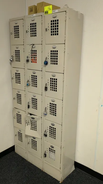 Win-Holt 6-compartment metal locker units. Features vented compartment doors and padlock hasps. Dimensions: 1' x 1' x 6-1/2' each. Note: One compartme