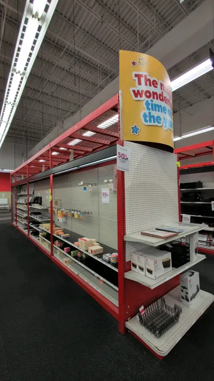 60'L of Madix gondola shelving. Features 108"H uprights, 18"/18" base shelves, Madix overspan racking with wire decking, integrated canopy lighting, a