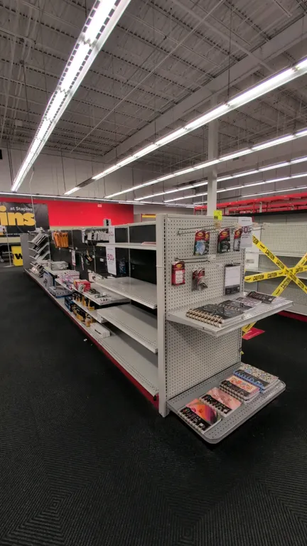60'L of Madix gondola shelving. Features 60"H uprights, 18"/18" base shelves, pegboard backing, and adjustable upper shelving. Contents not included.