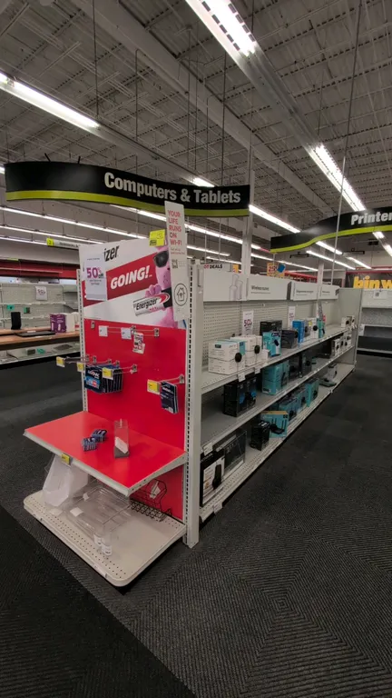 38'L of Madix gondola shelving. Features 60"H uprights, 18"D base shelves, pegboard backing, and adjustable shelves. Contents not included. Note: Gond