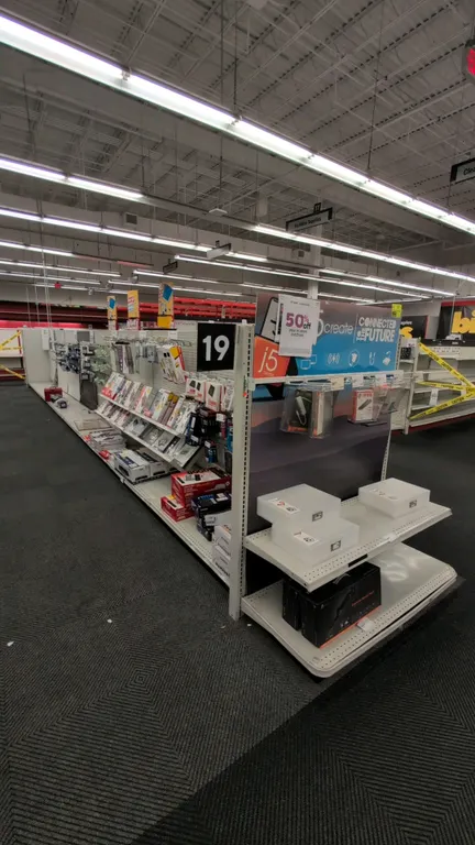70'L of Madix gondola shelving. Features 22"/22" base shelves and 60"H uprights with pegboard backing. Contents not included. Note: Gondola shelving i