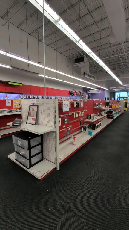 88'L of Madix gondola shelving. 60"H uprights with 22"/22" base shelves. Features red pegboard backing and metal shelves. Contents not included. Note: