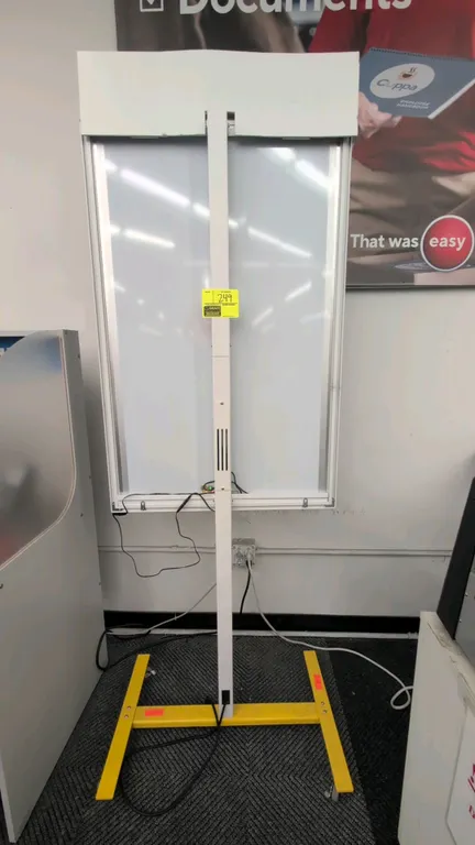 Omnify LLB12-S-29X45-2-33 LED portable electric sign. Features backlit lightbox display panel and white metal upright stand. Overall dimensions: 29"W