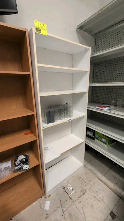 Wood 5-tier bookshelf. Features white laminate finish and adjustable shelving. 28"W x 72"H. Contents not included.