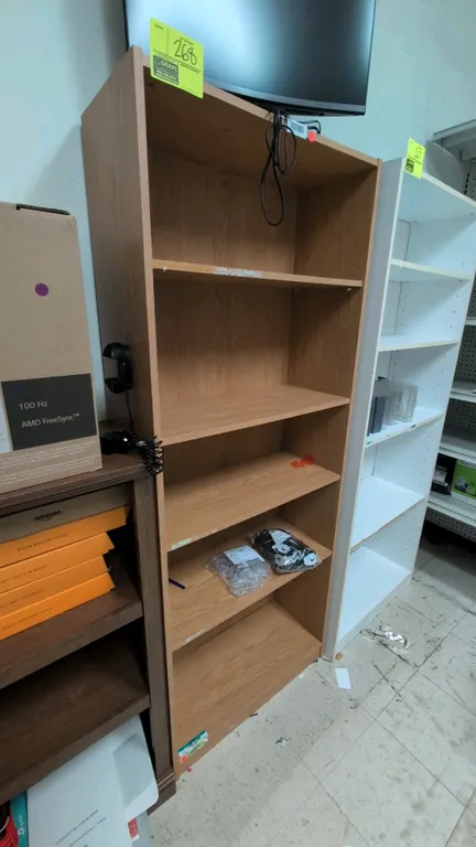 Wood 5-tier bookshelf. Features woodgrain laminate finish and adjustable shelving. 28"W x 72"H. Contents and monitor not included.