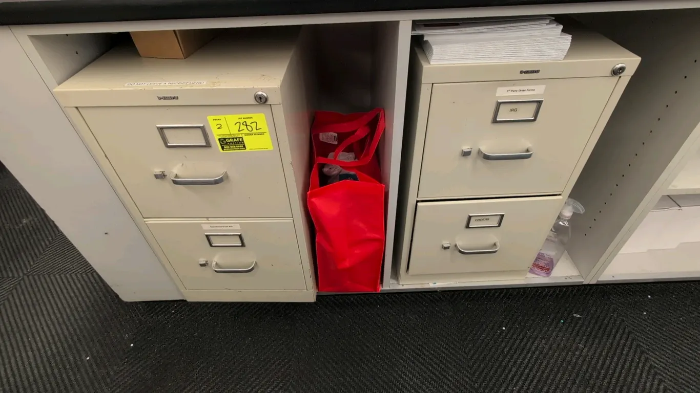 Hirsh metal 2-drawer vertical filing cabinets. Features 2-tier drawer configuration, pull handles with thumb latches, label holders, and top key lock.