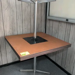 Laminate dining tables. Features square tops with a woodgrain finish. 3' x 3'. Mounted on metal 4-prong pedestal bases with leveling glides.