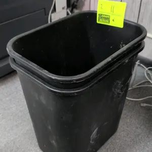 Poly waste bins. Features black molded plastic construction. Dimensions: 14" x 15"H each.