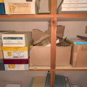 Assorted stationery envelopes and cookbooks lot. Includes partial boxes of Hammermill Bond, Classic Laid, and Wausau Text envelopes, clasp envelopes, 