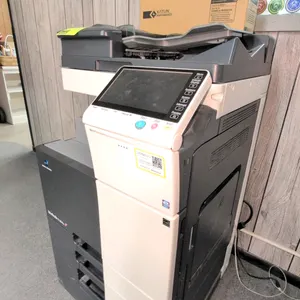 2013 Konica Minolta bizhub C364e color laser multifunction printer. Features touchscreen display, automatic document feeder, flatbed scanner, and mult