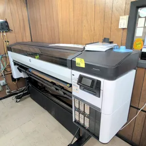 2022 HP DesignJet Z6 Pro 64" large-format production printer. Features roll feed, media catch basket, touchscreen control panel, extra ink cartridges,
