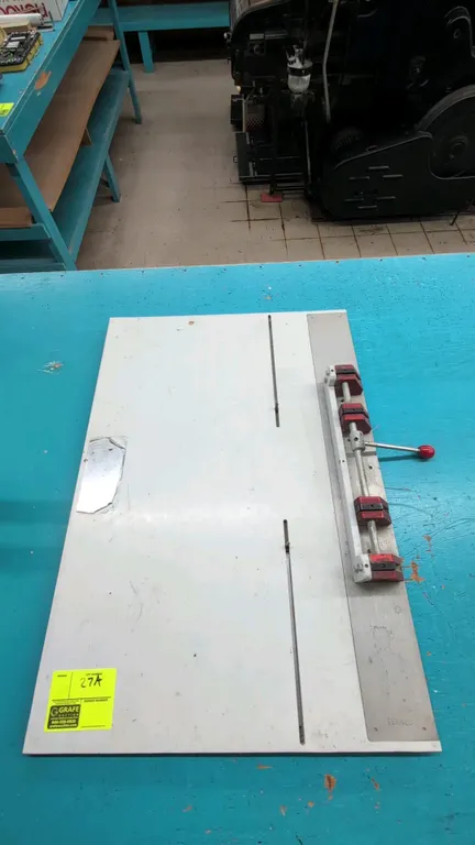1985 Ternes precision plate punch. Features manual lever-action punch mechanism with alignment guides. S/N: 102185DLC2. Dimensions: 34" x 24".