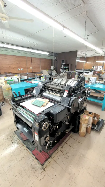 Heidelberg KOR single-color sheet-fed rotary offset/letterset printing press. Maximum sheet size: 18" x 22-1/2". Includes manuals, parts books, (2) pa