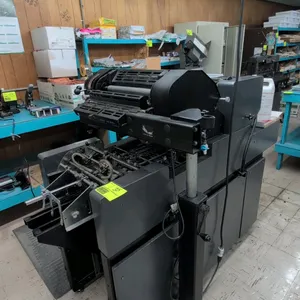 Amergraph Multi 1450 K offset duplicator printing press. Features Townsend Industries T-51 swing-away second color head, digital counter, adjustable w