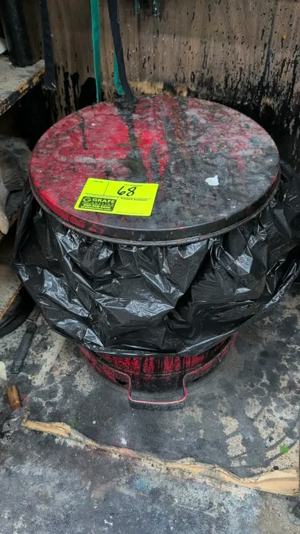 Metal oily waste safety can. Features foot pedal operation and self-closing lid. Includes soiled shop rags. 15" x 17"H.