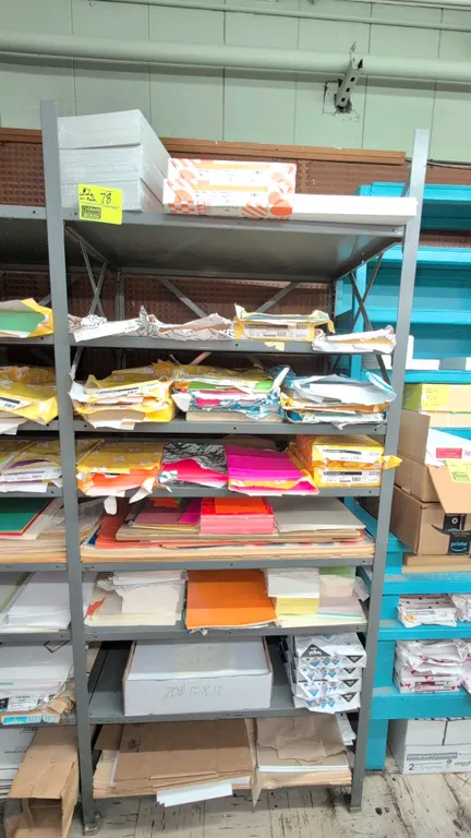 Assorted paper products and cardboard boxes. Includes assorted reams and partial packages of colored and white paper stock, vellum bristol, cover stoc