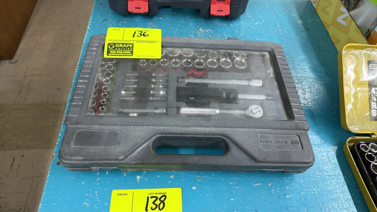 Evercraft mechanic's tool set. Includes assorted SAE and metric sockets, ratchet, extension bars, spark plug socket, multi-bit screwdriver, and driver