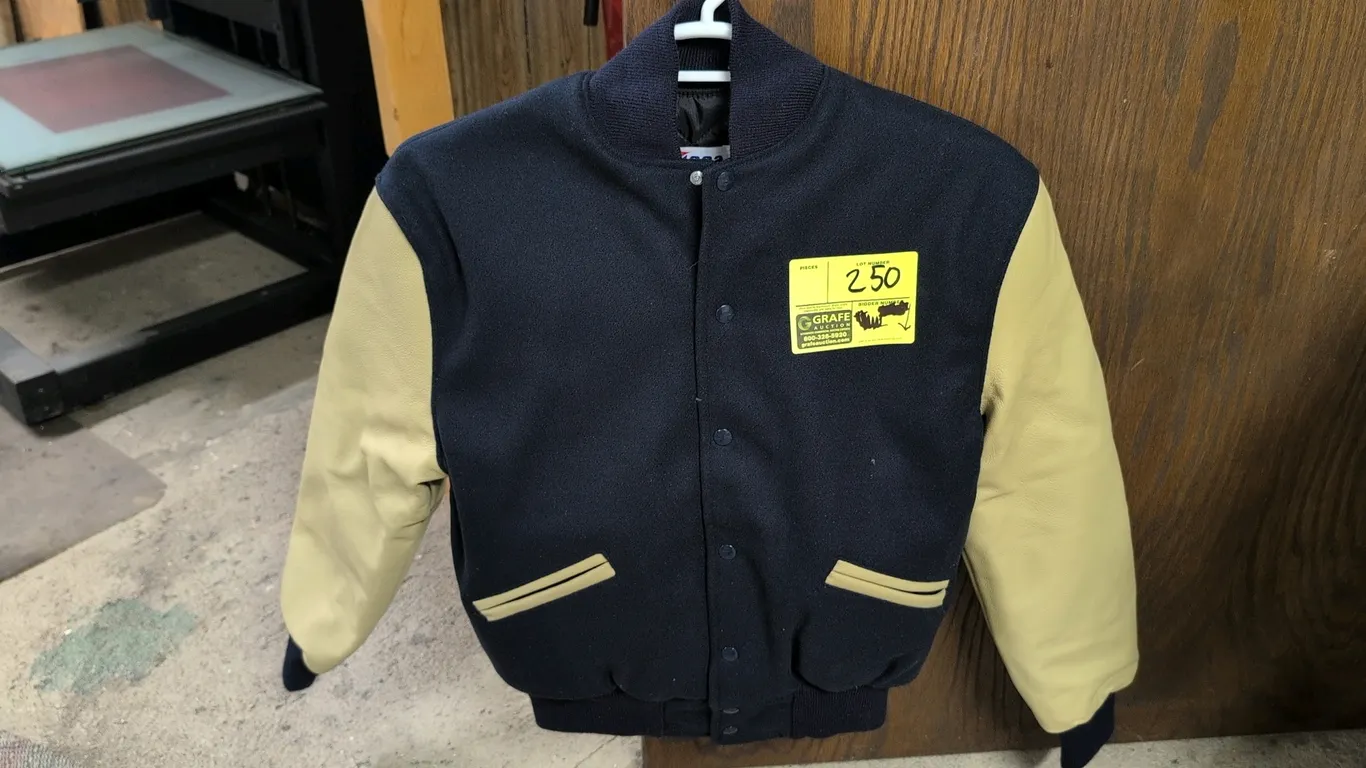 Meca Crookston Pirates letterman jacket. Size Medium. Features navy blue Melton wool shell, contrast sleeves, snap button front closure, front pockets