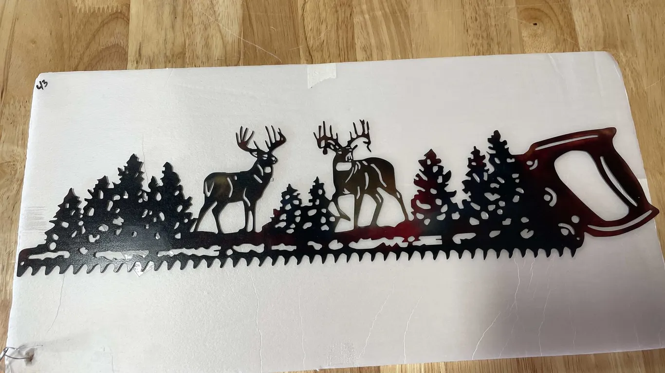 Laser cut metal sign of saw and deer (T2)
