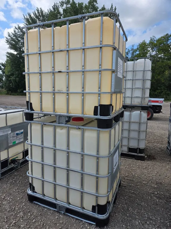 (2) 250 GAL CAGE TOTES