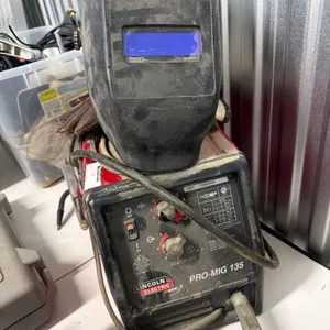 LINCOLN ELECTRIC PRO MIG 135 WELDER WITH HELMET
