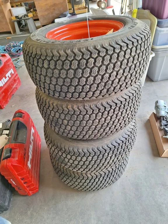 4 Tires and Rims, 23x8.5x12, Come of Bobcat L28 Articulate Loader