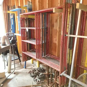 Scaffolding: 14 Wasco 5'x5' Uprights, 4 Bil-Jax 5'x5' Uprights, 8 Wheels, 14 Leveling Feet, Railing, Stairs, Crossbraces