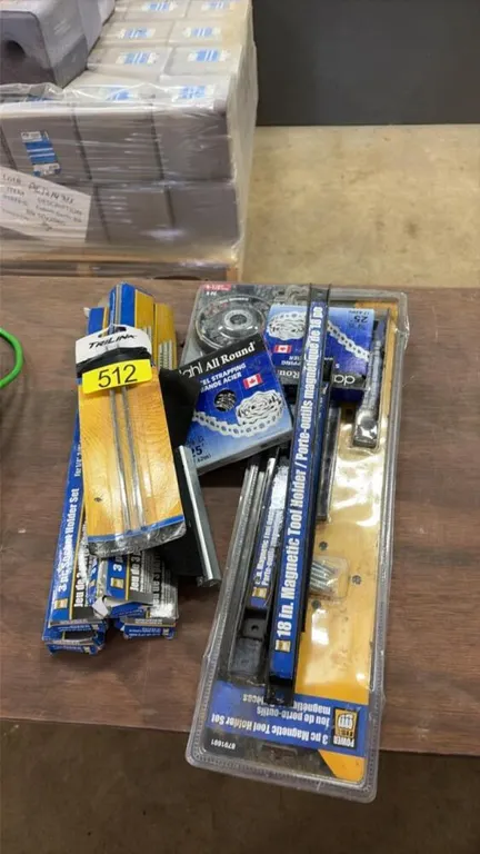 Assorted shop magnets, grinder blades, shop organizers