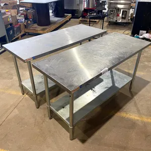 (2) Omega Stainless Steel Work Tables
 UNRESERVED