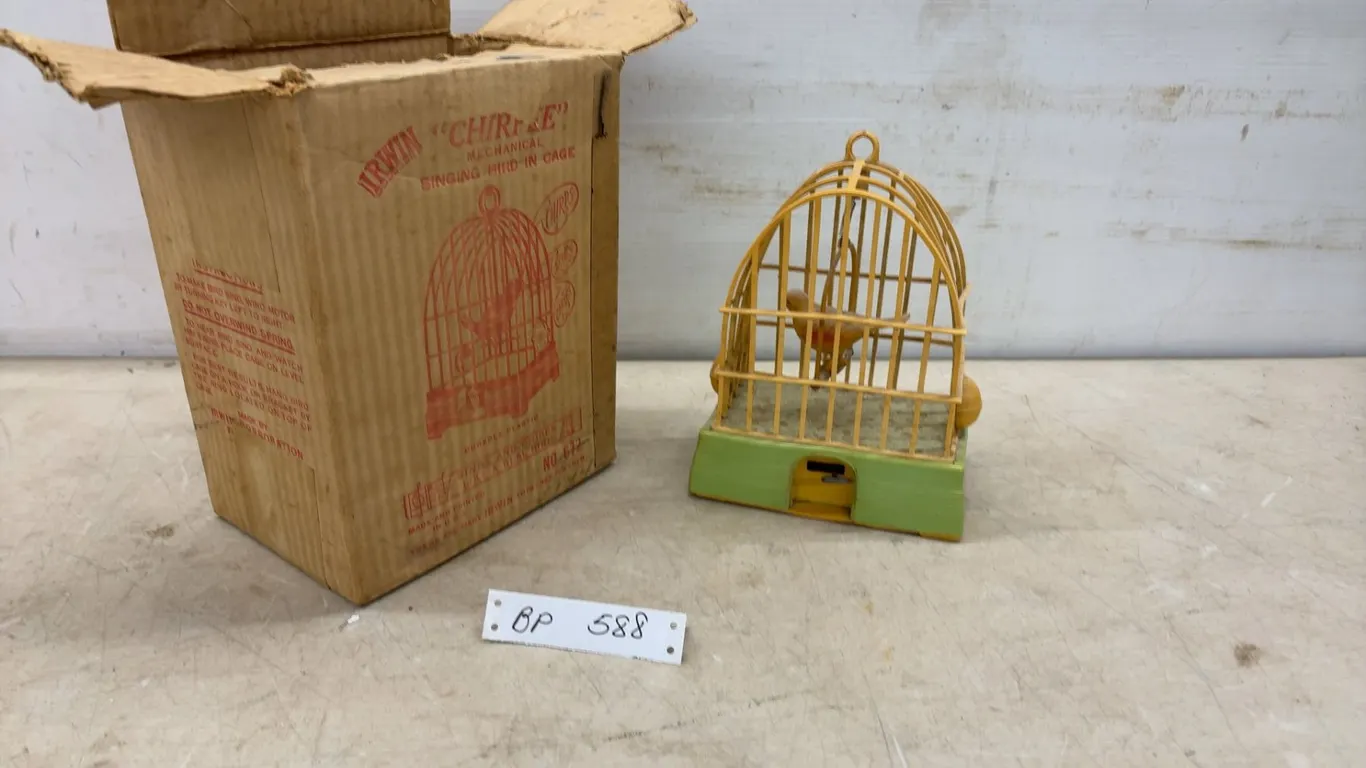 Vintage Irwin "Chirpee" Mechanical Singing Bird in Cage No. 672, Yellow and Green Plastic, With Box