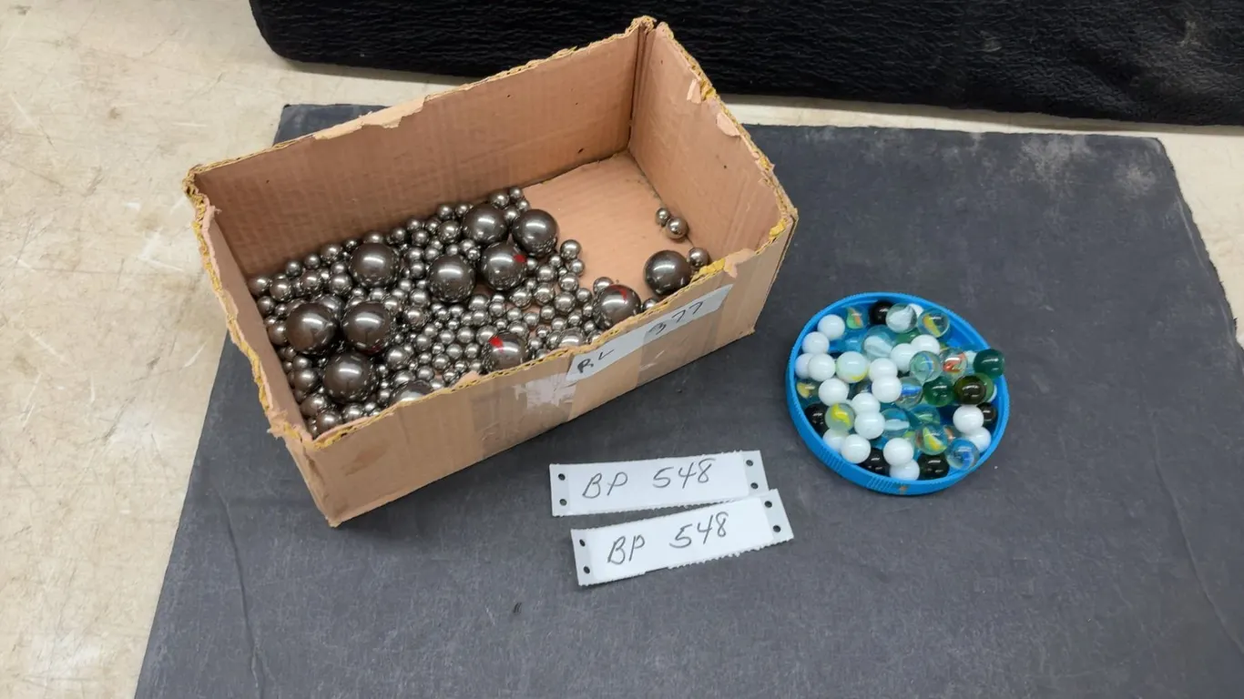 Assorted Steel Ball Bearings in Various Sizes and Glass Marbles