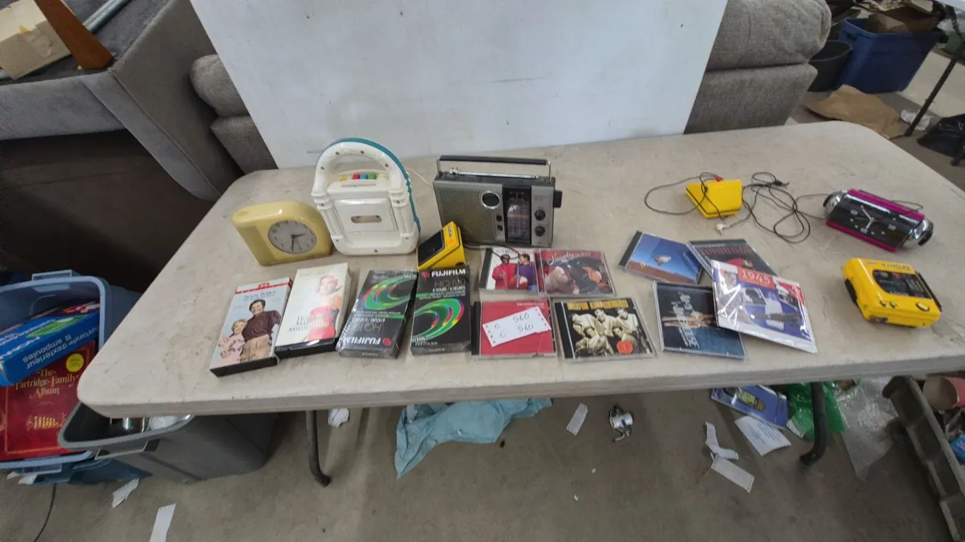 Vintage Electronics and Media: GE Alarm Clock, Cassette Player, Radio, VHS Tapes, CDs