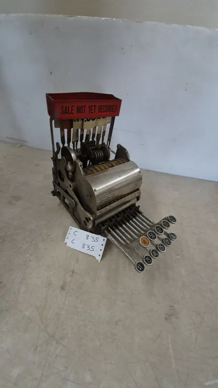 Antique Cash Register with “Sale Not Yet Recorded” Sign and Price Keys