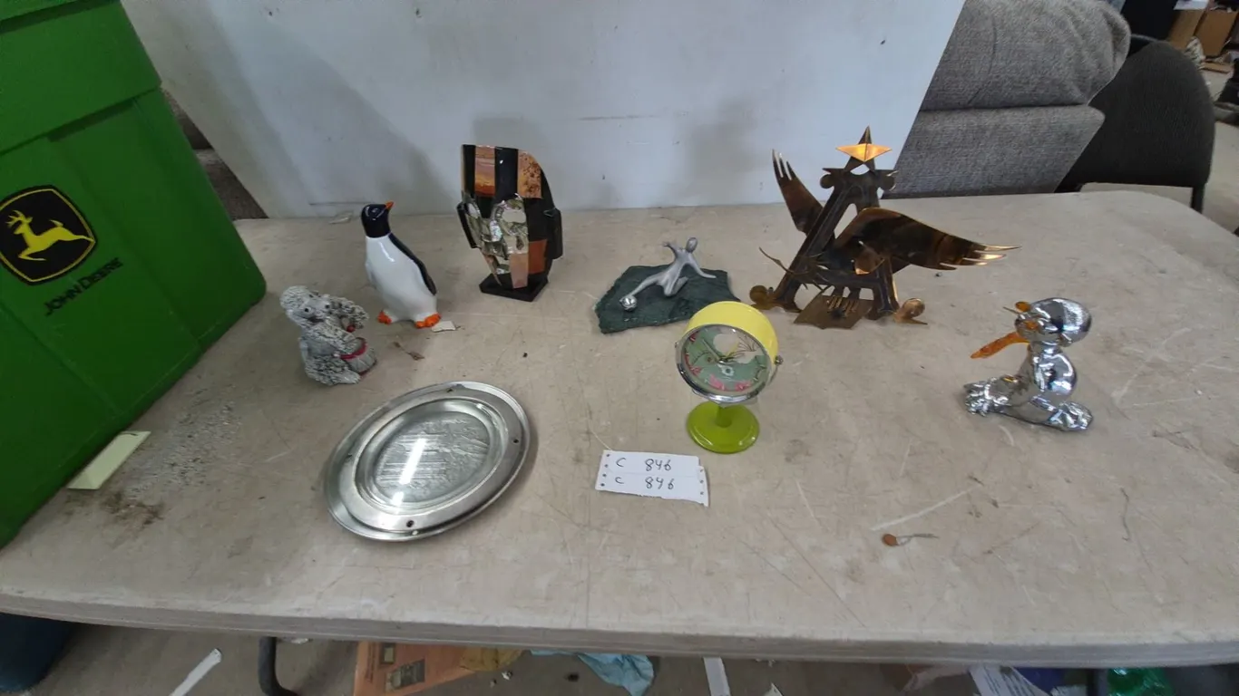 Assorted Decor: Metal Eagle Sculpture, Penguin Figurine, Stone Mask