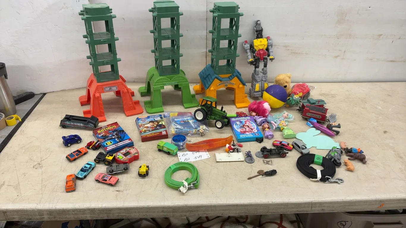 Assortment of Children's Toys Including Thomas and Friends Playsets, Transformer, Dolls, Cars
