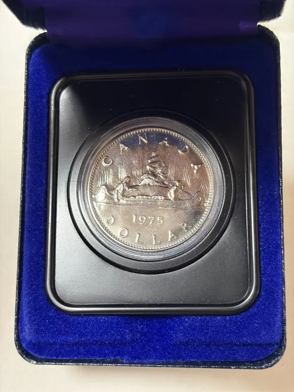 1975 Nickel Dollar. Specimen. Housed in its original case.