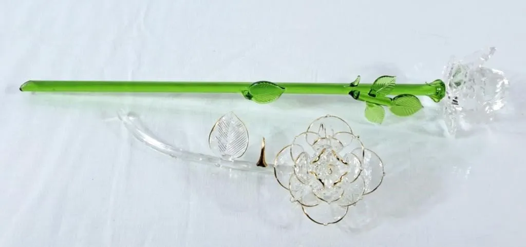 Two lovely glass flowers, couple small chips in