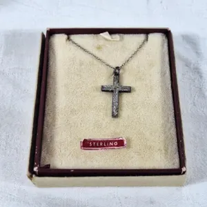 Sterling cross pendant with unmarked chain