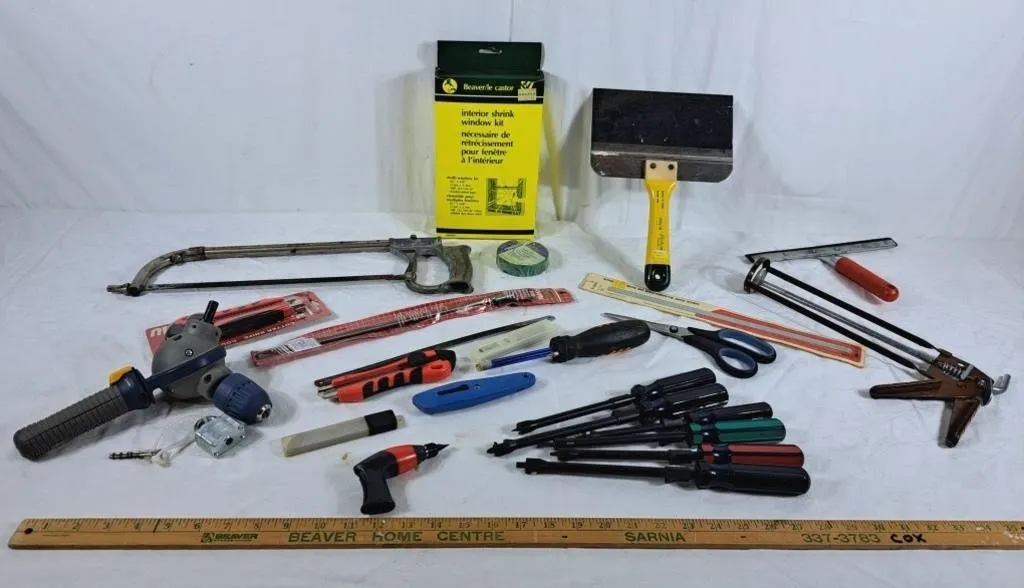 Lot of various tool including screwdrivers, hand