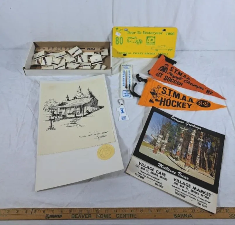 Lot of collectable trinkets, pendants, matches